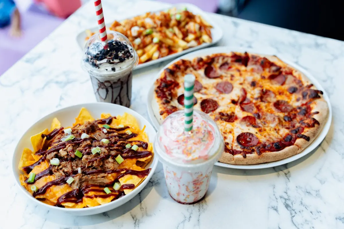 Pizza, loaded nachos, fries and milkshakes from the Little Astronauts kitchen